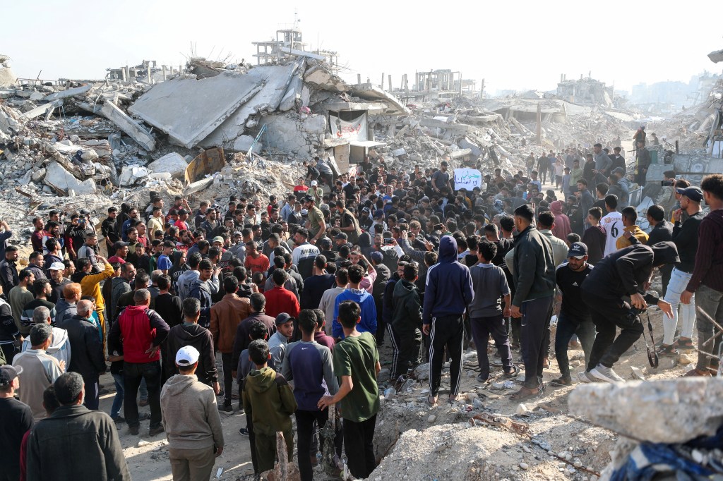 Palestinians protest to demand an end to war, chanting anti-Hamas slogans, in Beit Lahiya in northern Gaza on March 26, 2025.