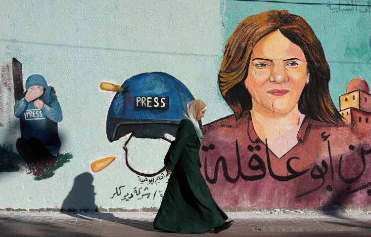 A mural of slain of Al Jazeera journalist Shireen Abu Akleh on a wall in Gaza City in 2022.